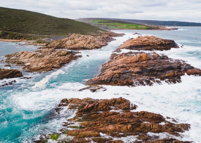 Granite rocks and surf near Canal Rocks on the Yallingup to Injidup day hike