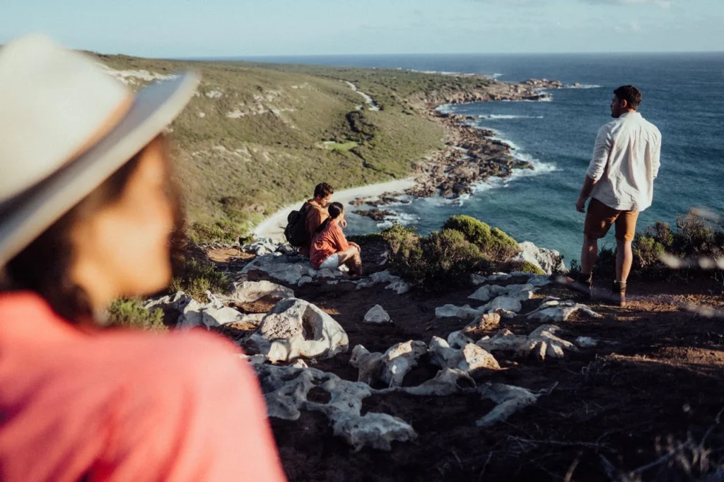 Hikers on the clifftops between Contos and Redgate on a Cape to Cape day hike